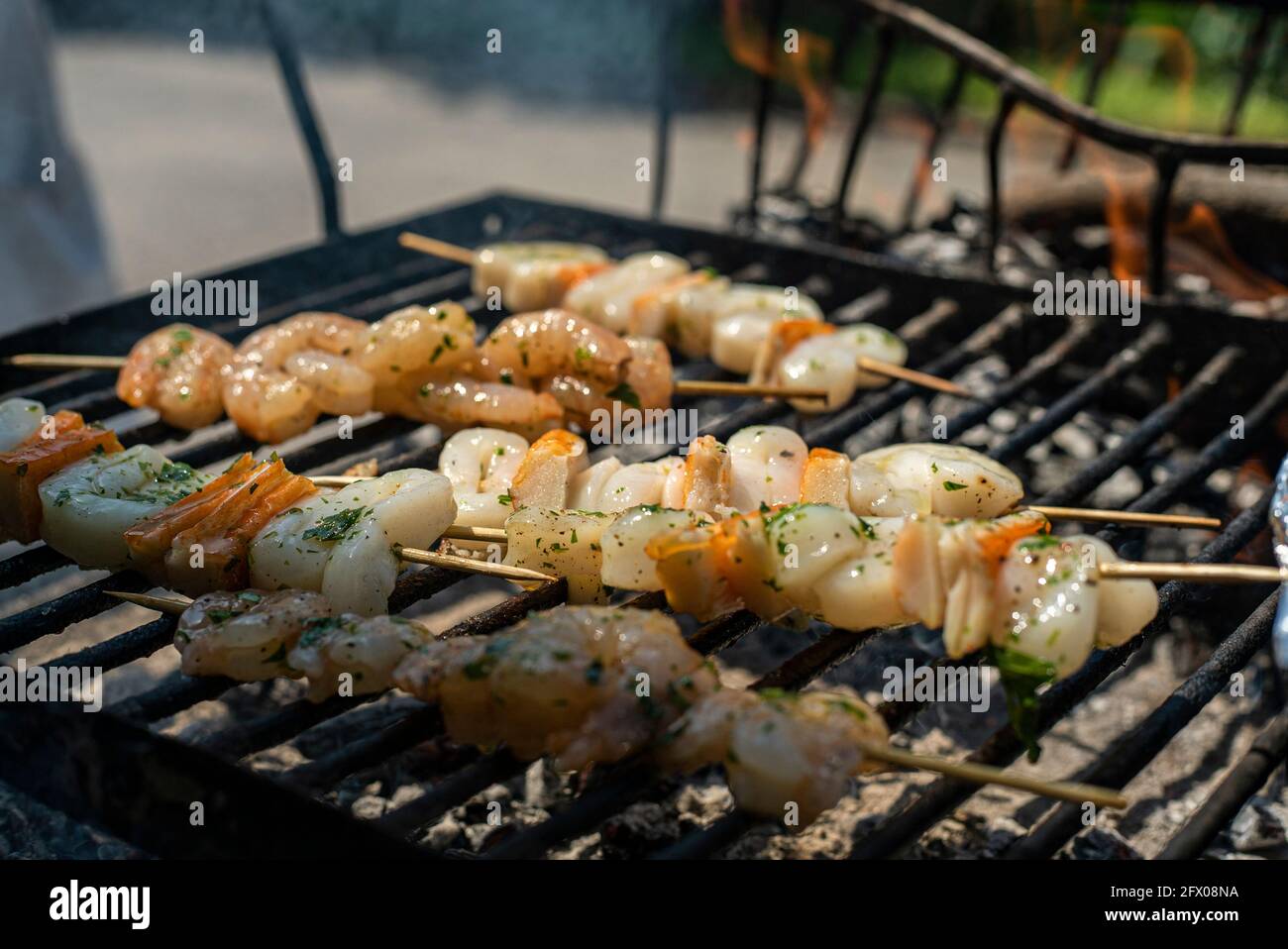 Fish skewers on the grill 2 Stock Photo Alamy