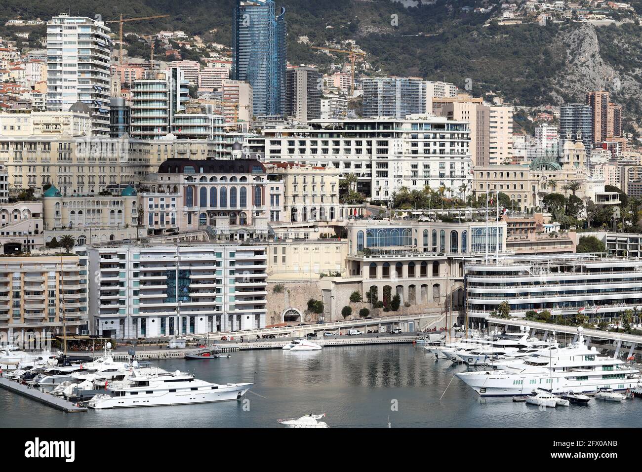 La Condamine, Monaco - February 20, 2021: Beautiful Aerial View Of Luxurious Skyscrapers, Buildings And Yachts On Port Hercule In Monaco On The French Stock Photo