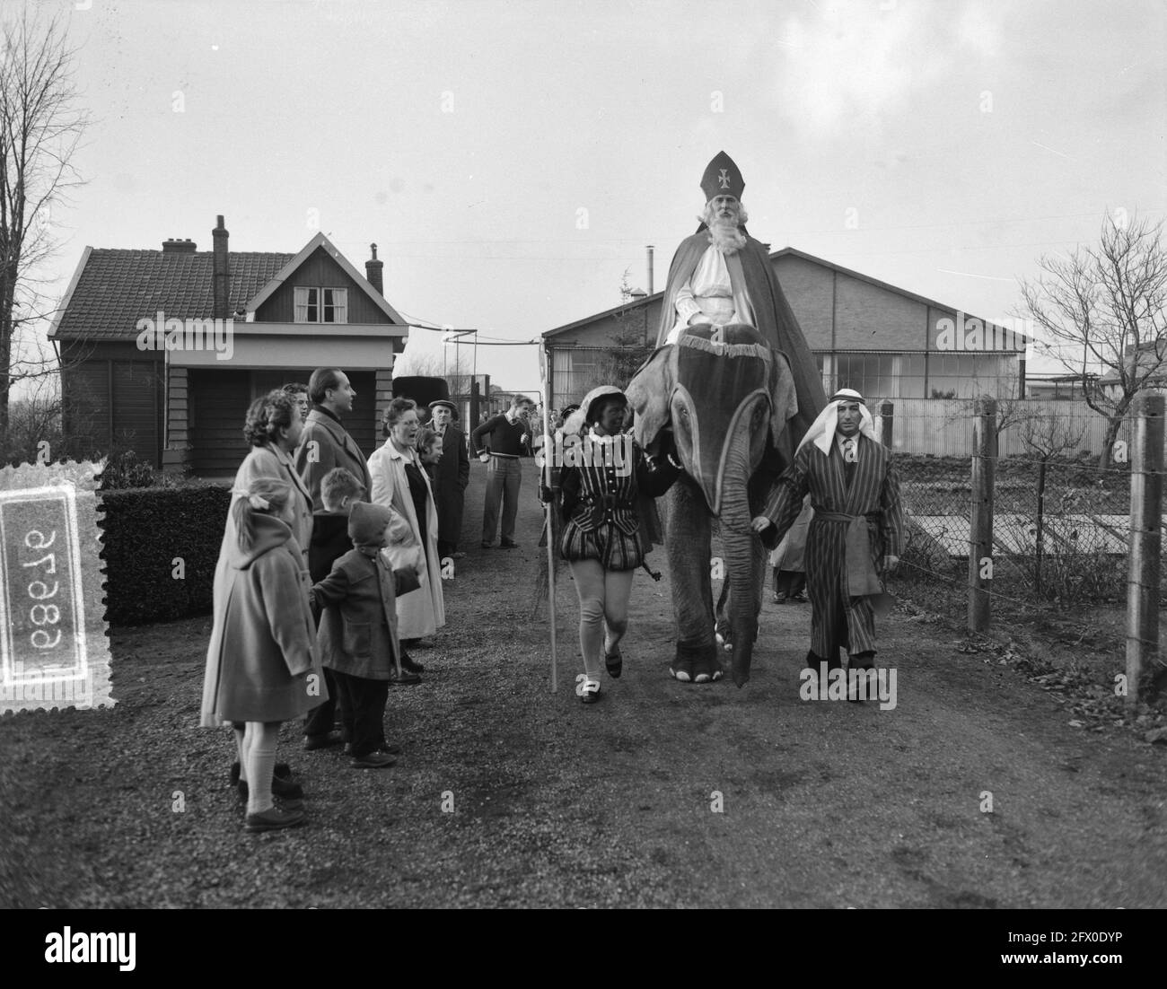 Saint Nicholas on elephant visiting Chemical Factory Naarden, December 1, 1954, OLIFANTS, The Netherlands, 20th century press agency photo, news to remember, documentary, historic photography 1945-1990, visual stories, human history of the Twentieth Century, capturing moments in time Stock Photo
