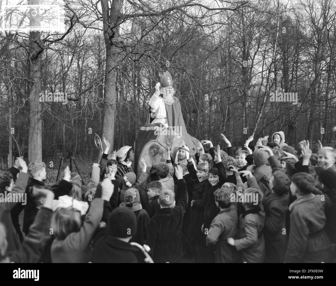 Saint Nicholas on elephant visits Chemical Factory Naarden, December 1, 1954, OLIFANTS, The Netherlands, 20th century press agency photo, news to remember, documentary, historic photography 1945-1990, visual stories, human history of the Twentieth Century, capturing moments in time Stock Photo