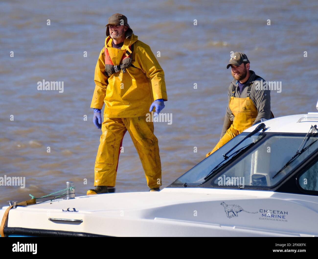 Crab and lobster fishermen returning to beach after session. Hornsea. East Yorkshire. UK. Stock Photo