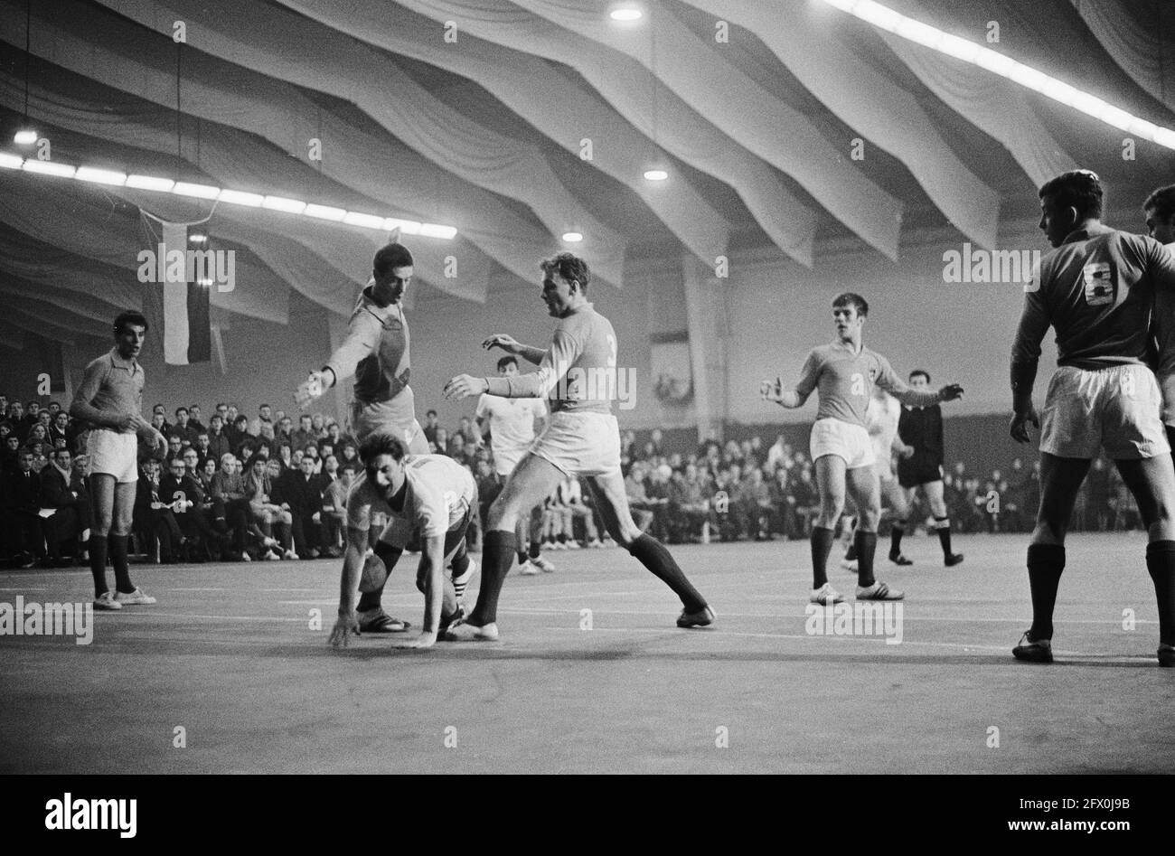 Indoor handball Netherlands against France at The Hague, Fran attack by R. Lambert far left the Dutchman Jaap Bax, 7 February 1965, Indoor handball, The Netherlands, 20th century press agency photo, news to remember, documentary, historic photography 1945-1990, visual stories, human history of the Twentieth Century, capturing moments in time Stock Photo