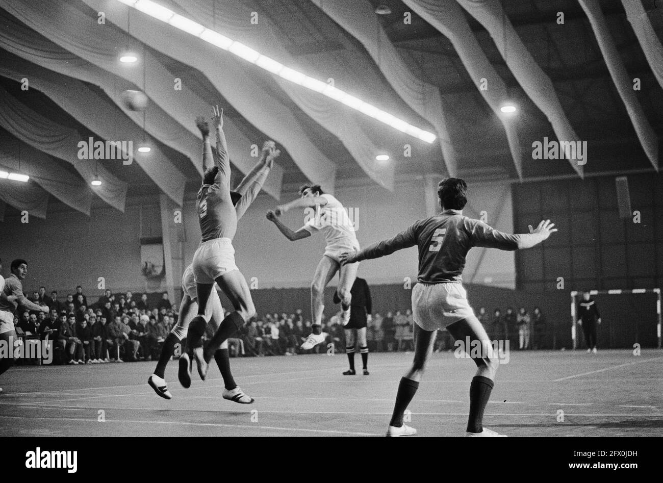 Indoor handball Netherlands against France in The Hague, match moments, 7 February 1965, indoor handball, The Netherlands, 20th century press agency photo, news to remember, documentary, historic photography 1945-1990, visual stories, human history of the Twentieth Century, capturing moments in time Stock Photo