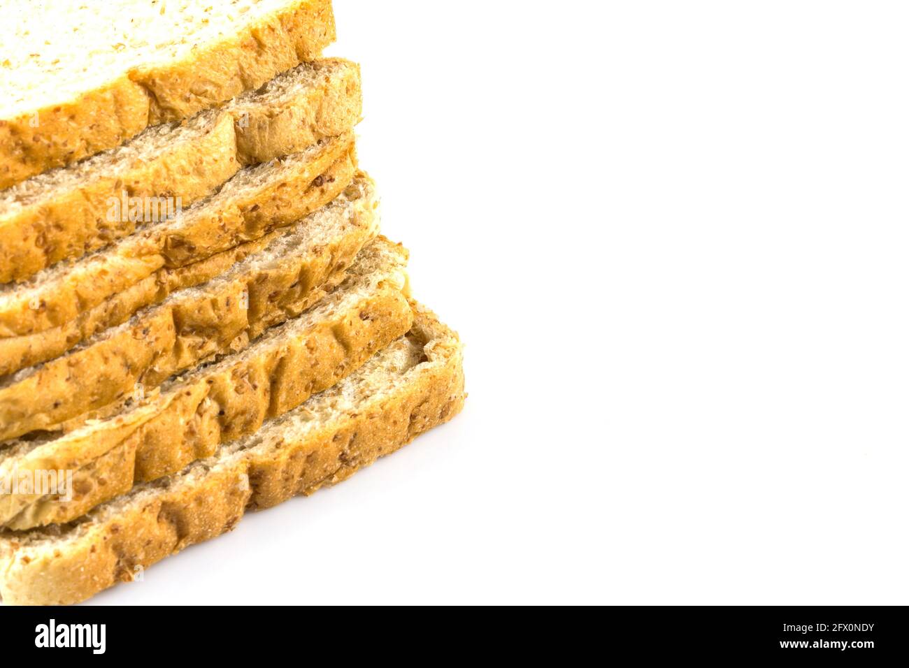 Whole wheat sliced bread on white background Stock Photo - Alamy