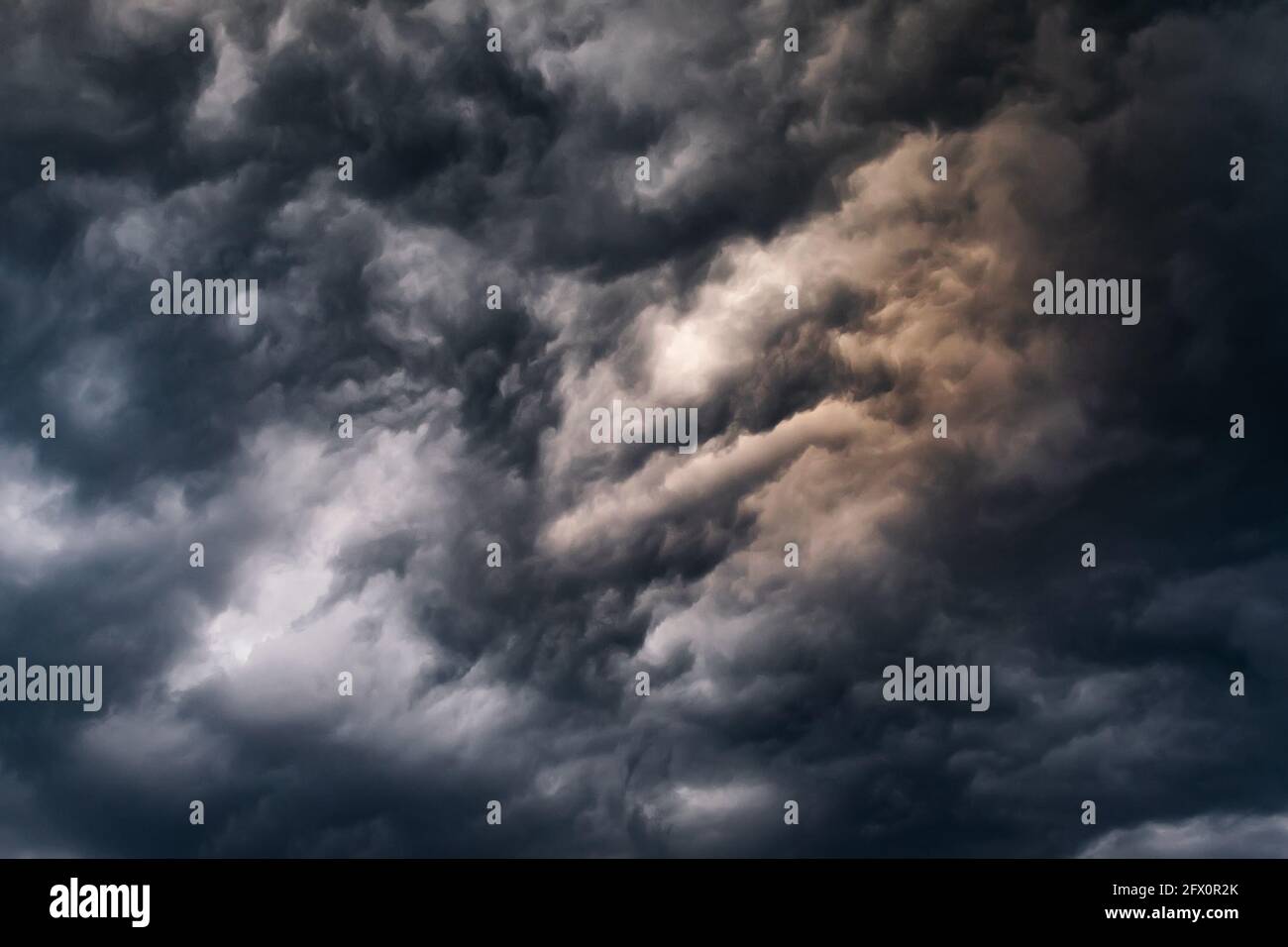 Dark stormy rain cloudy sky during monsoon rainy season. Stock Photo