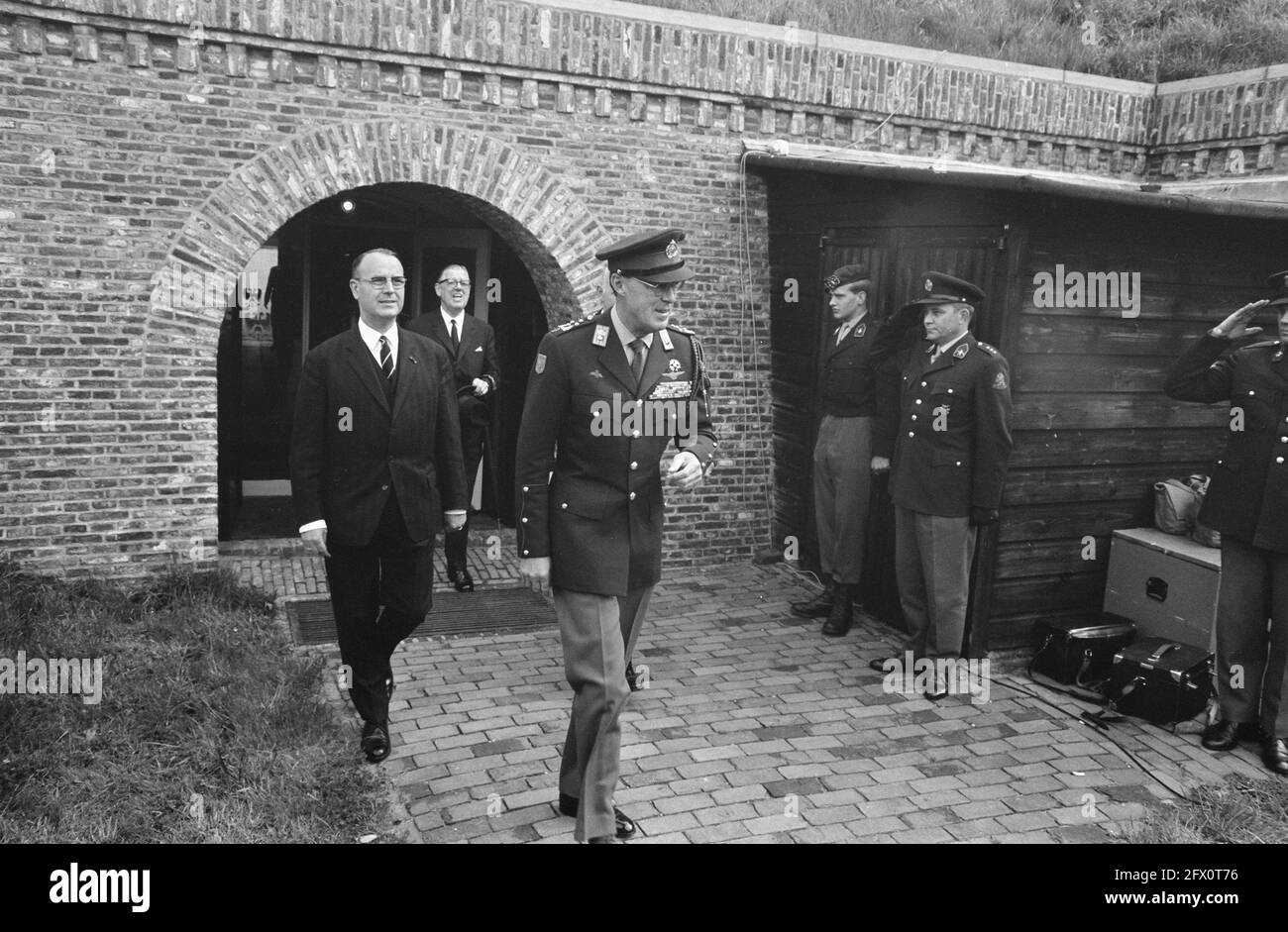 HRH Prince Bernhard opens expansion of the Fortress Museum in Naarden Prince Bernhard lights a fuse in a cannon, May 7, 1969, museums, openings, princes, The Netherlands, 20th century press agency photo, news to remember, documentary, historic photography 1945-1990, visual stories, human history of the Twentieth Century, capturing moments in time Stock Photo