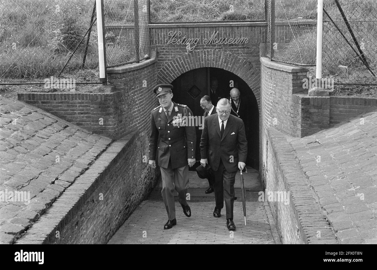 HRH Prince Bernhard opens expansion of the Fortress Museum in Naarden Prince Bernhard lights a fuse in a cannon, May 7, 1969, museums, openings, princes, The Netherlands, 20th century press agency photo, news to remember, documentary, historic photography 1945-1990, visual stories, human history of the Twentieth Century, capturing moments in time Stock Photo