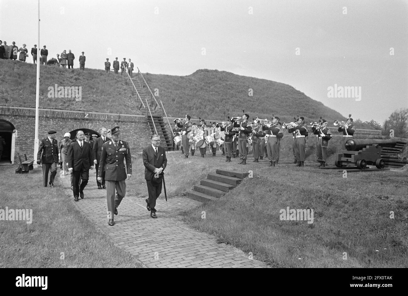 HRH Prince Bernhard opens expansion of the Fortress Museum in Naarden Prince Bernhard lights a fuse in a cannon, 7 May 1969, museums, openings, princes, The Netherlands, 20th century press agency photo, news to remember, documentary, historic photography 1945-1990, visual stories, human history of the Twentieth Century, capturing moments in time Stock Photo