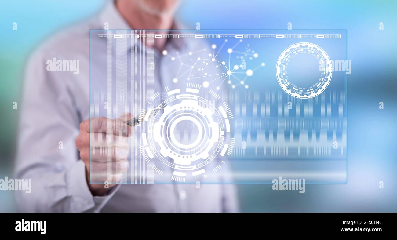 Man touching a virtual technology concept on a touch screen with a pen ...