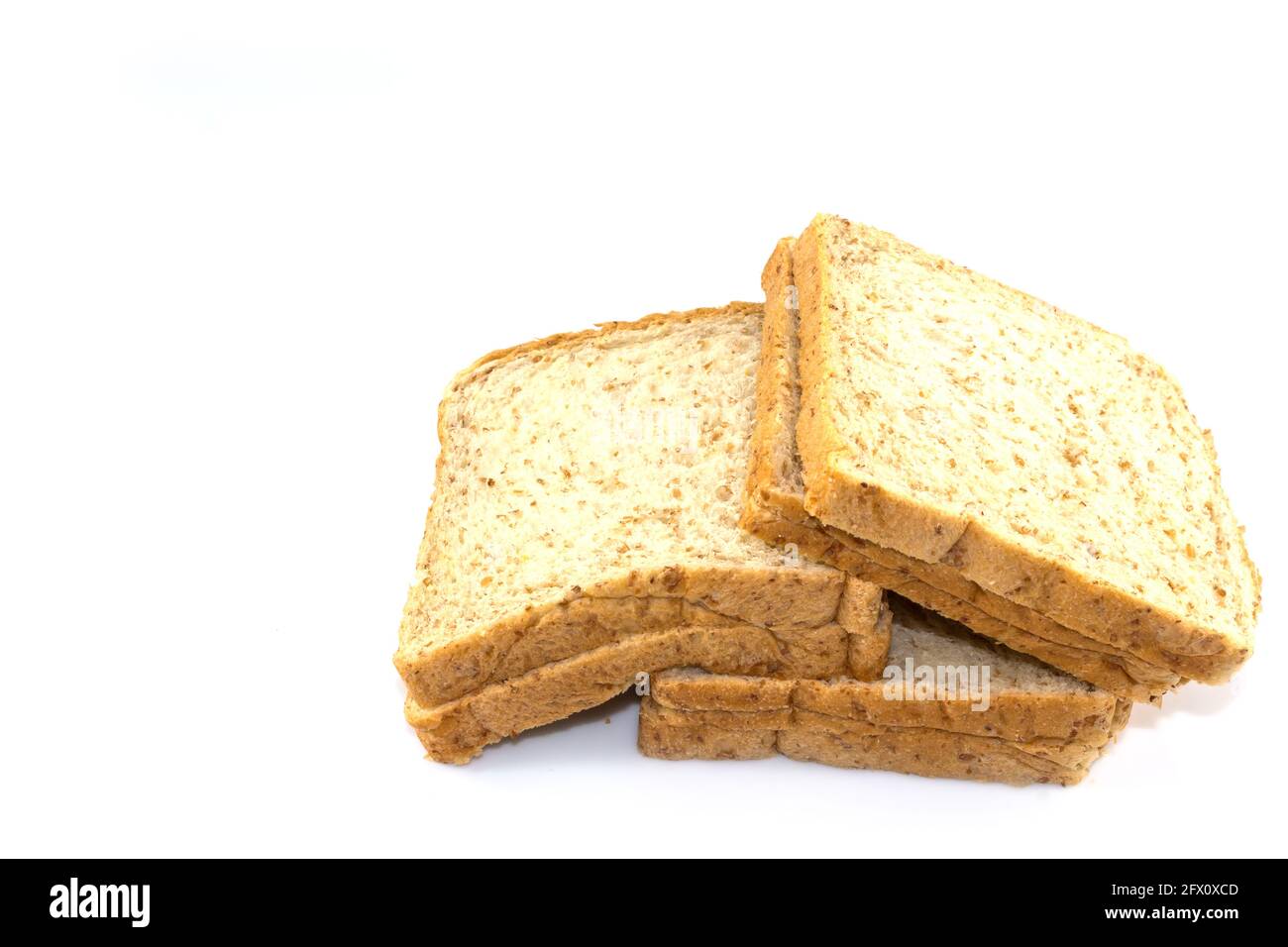 Whole wheat sliced bread on white background Stock Photo - Alamy
