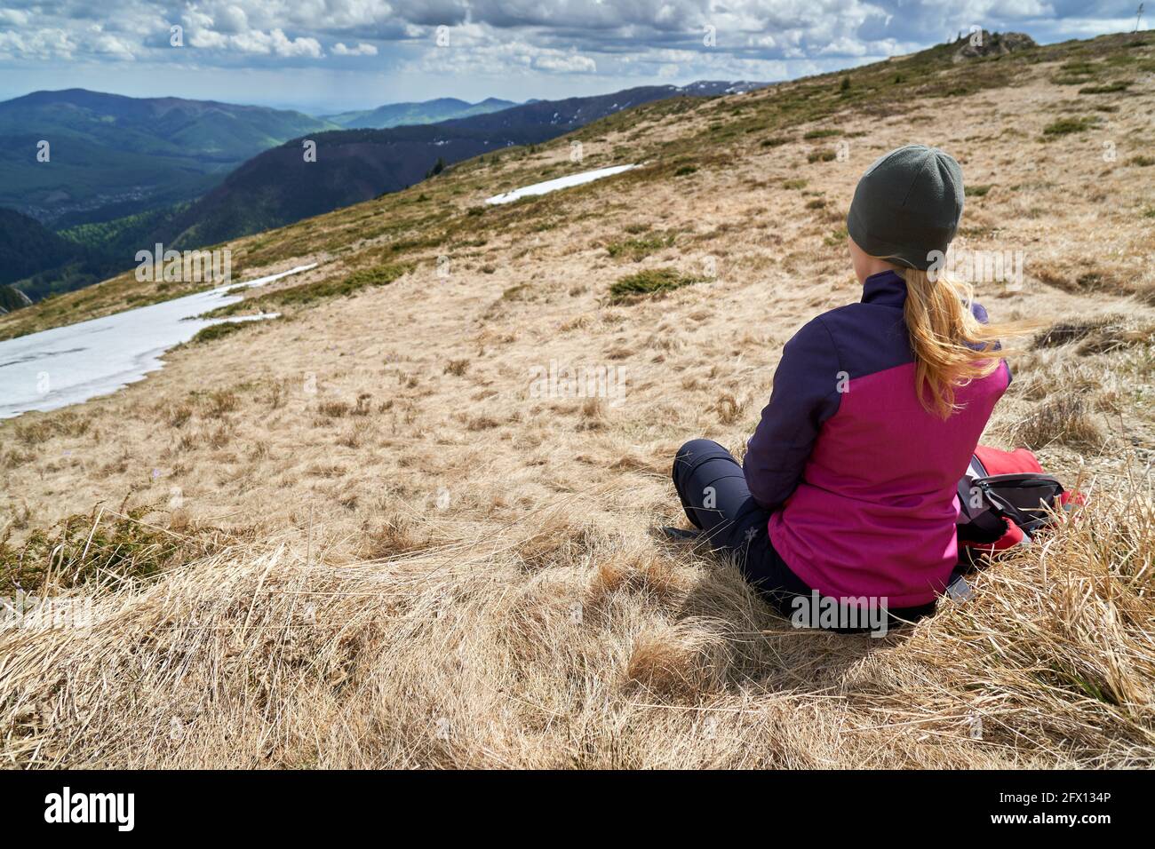 Girl sitting on top hi-res stock photography and images - Alamy