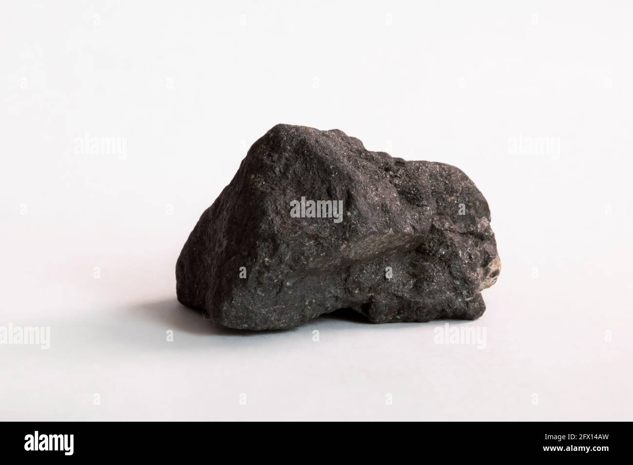 Specimen of Kiruna iron ore from Sweden on a white background Stock Photo