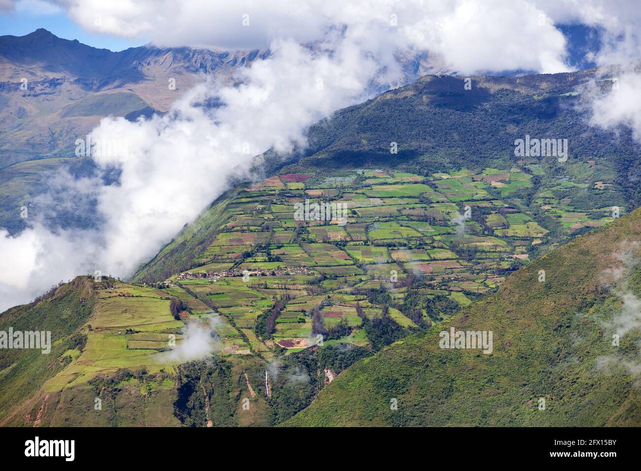Village and terraced field in peru, view from Choquequirao trekking trail, Cuzco area, Machu Picchu area, Peruvian Andes Stock Photo