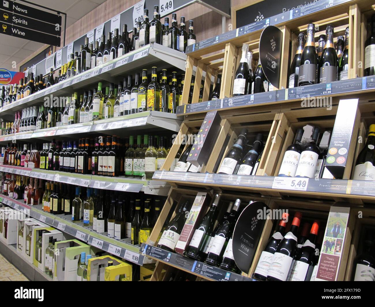 shelves stocked with alcoholic beverages inside Lidl supermarket Stock