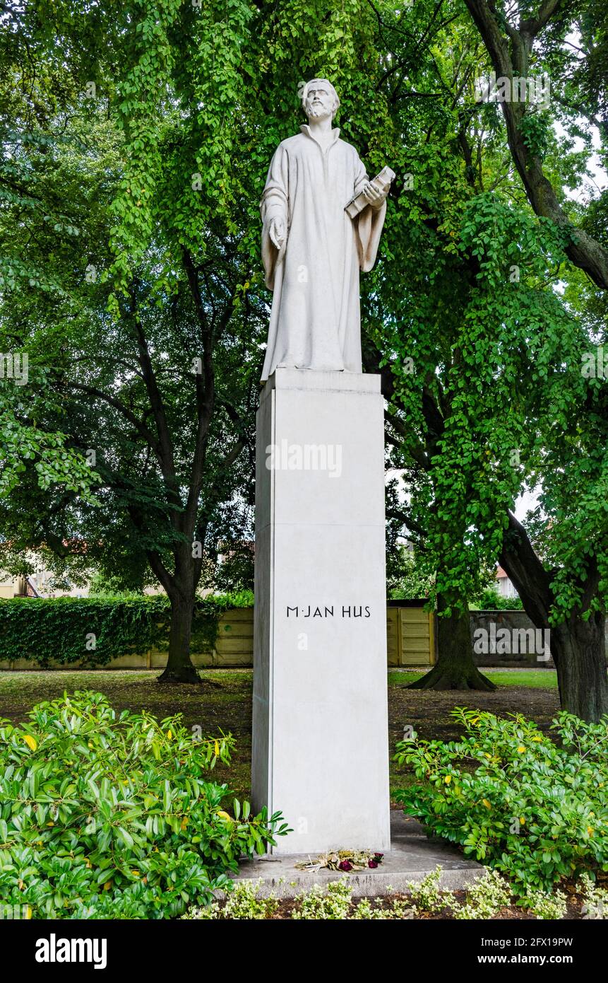 Jan Hus, a sandstone statue in a park, Nymburk, Czech republic, Europe Stock Photo