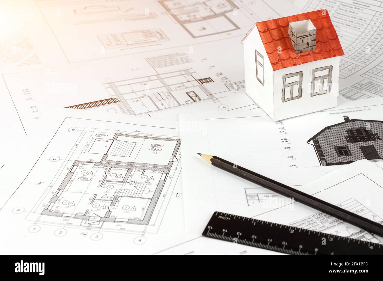 Architectural drawings and house concept. Architect Desk. Engineering blueprint. Construction background. Engineering tools Stock Photo