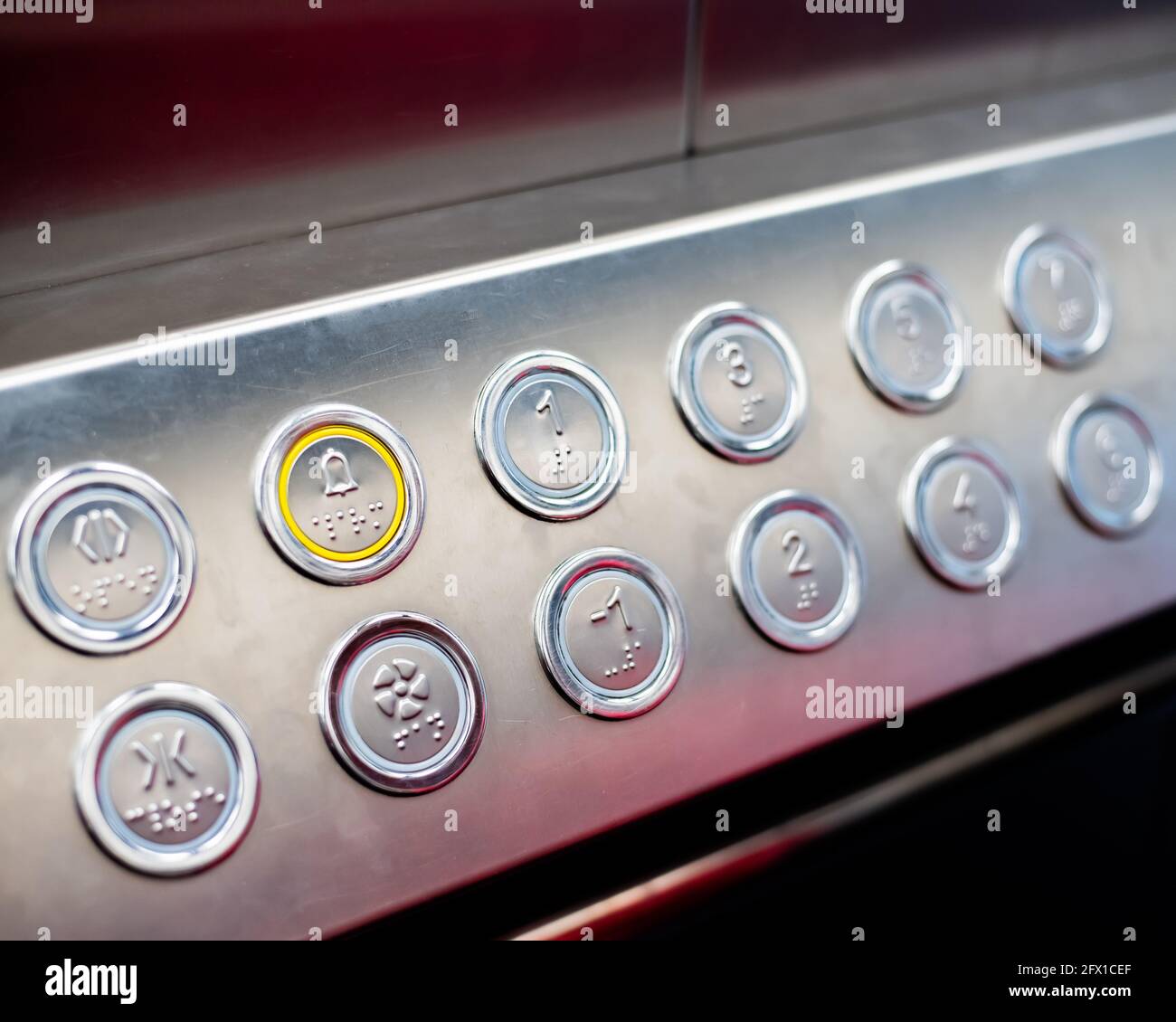 Buttons in the elevator with Braille code for blind people Stock Photo -  Alamy