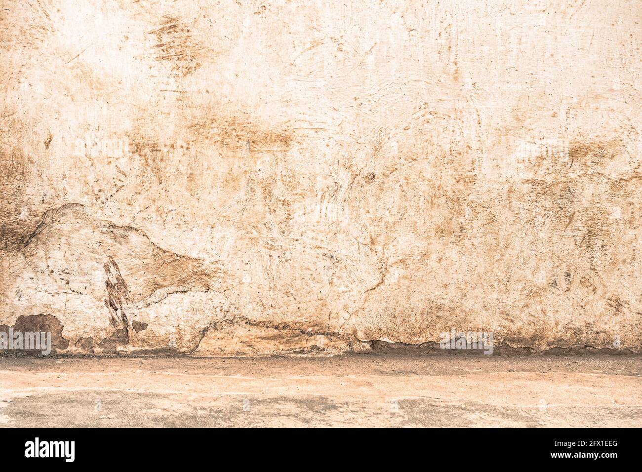 Empty wall with floor edge - Dramatic background scene with cracked stonewall for prison building - Enhanced contrast crispy filtered editing Stock Photo