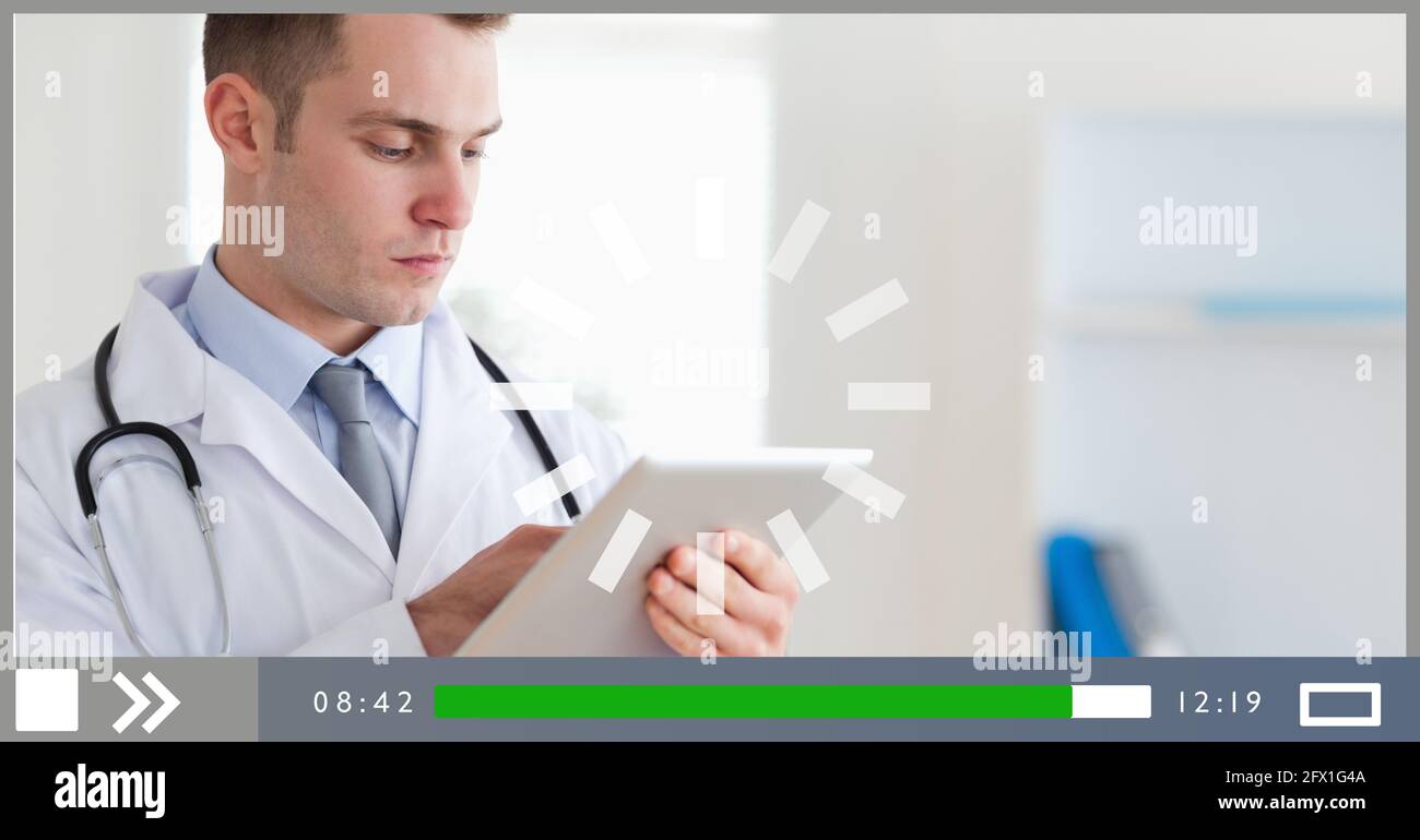 Composition of screen with medical data processing over male doctor ...