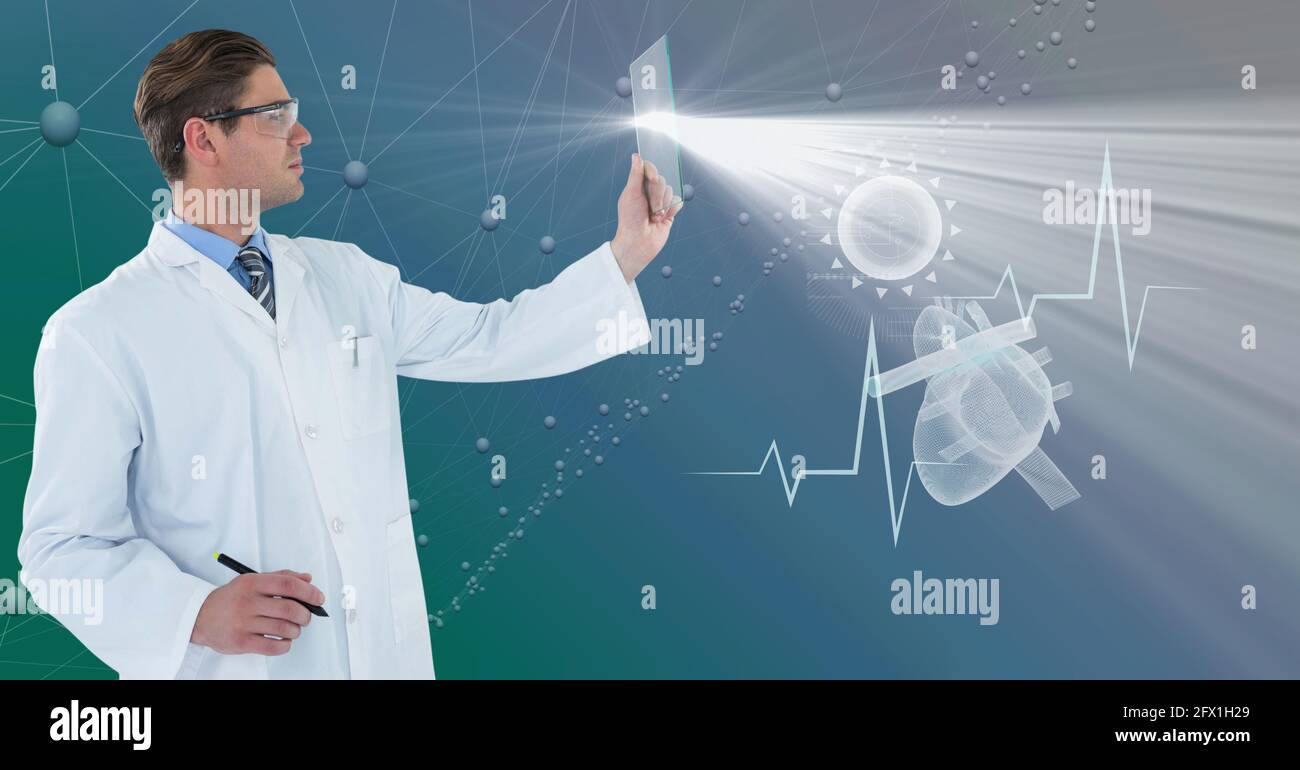 Composition of male doctor holding interactive screen with medical data ...