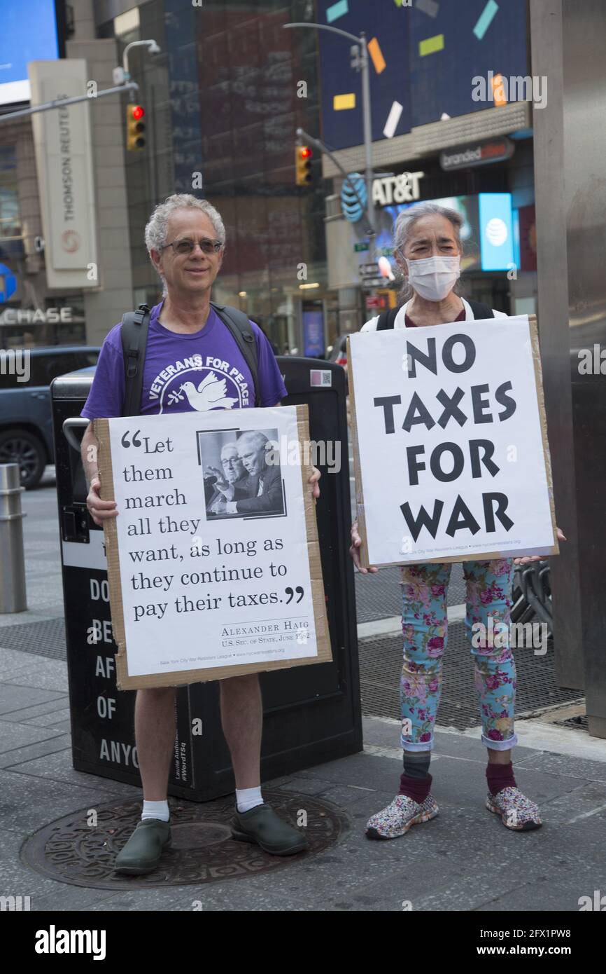 Members of the War Resisters League, Veterans for Peace, Raging Grannies and other organizations rallyed and marched in Times Square and through midtown Manhatan on Tax day  to urge Americans not to pay war taxes. Military expenditures are destroying our quality of life and do not help to solve the real problems that confront us as a nation and world. Stock Photo