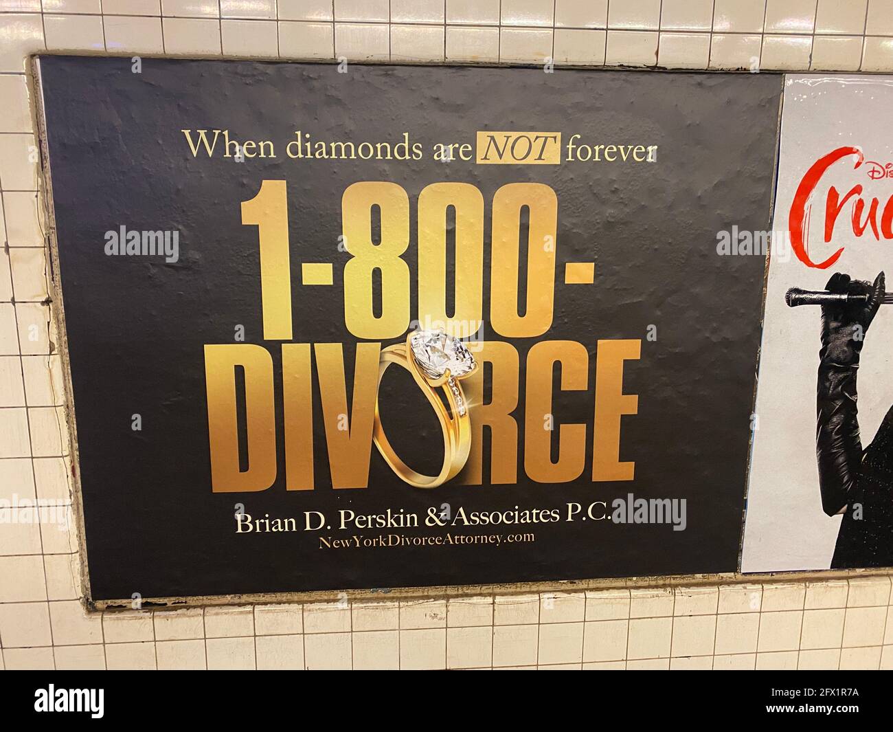 Large ad for fhe lucrative business for divorce lawyers in a subway station in Brooklyn, New York. Stock Photo