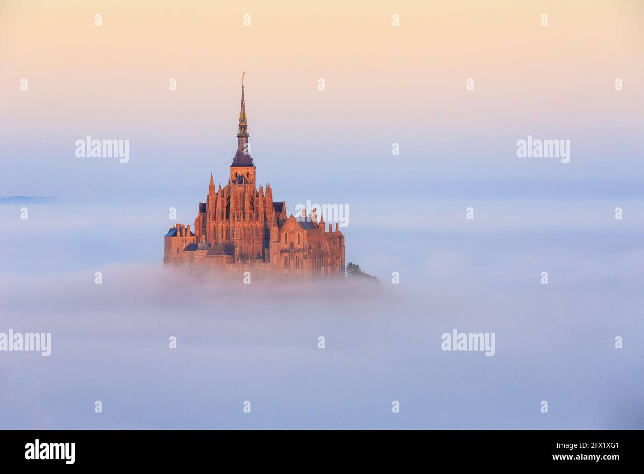 FRANCE. NORMANDY. MANCHE (50) AERIAL VIEW OF MONT SAINT MICHEL ABBEY IN THE MORNING MIST Stock Photo
