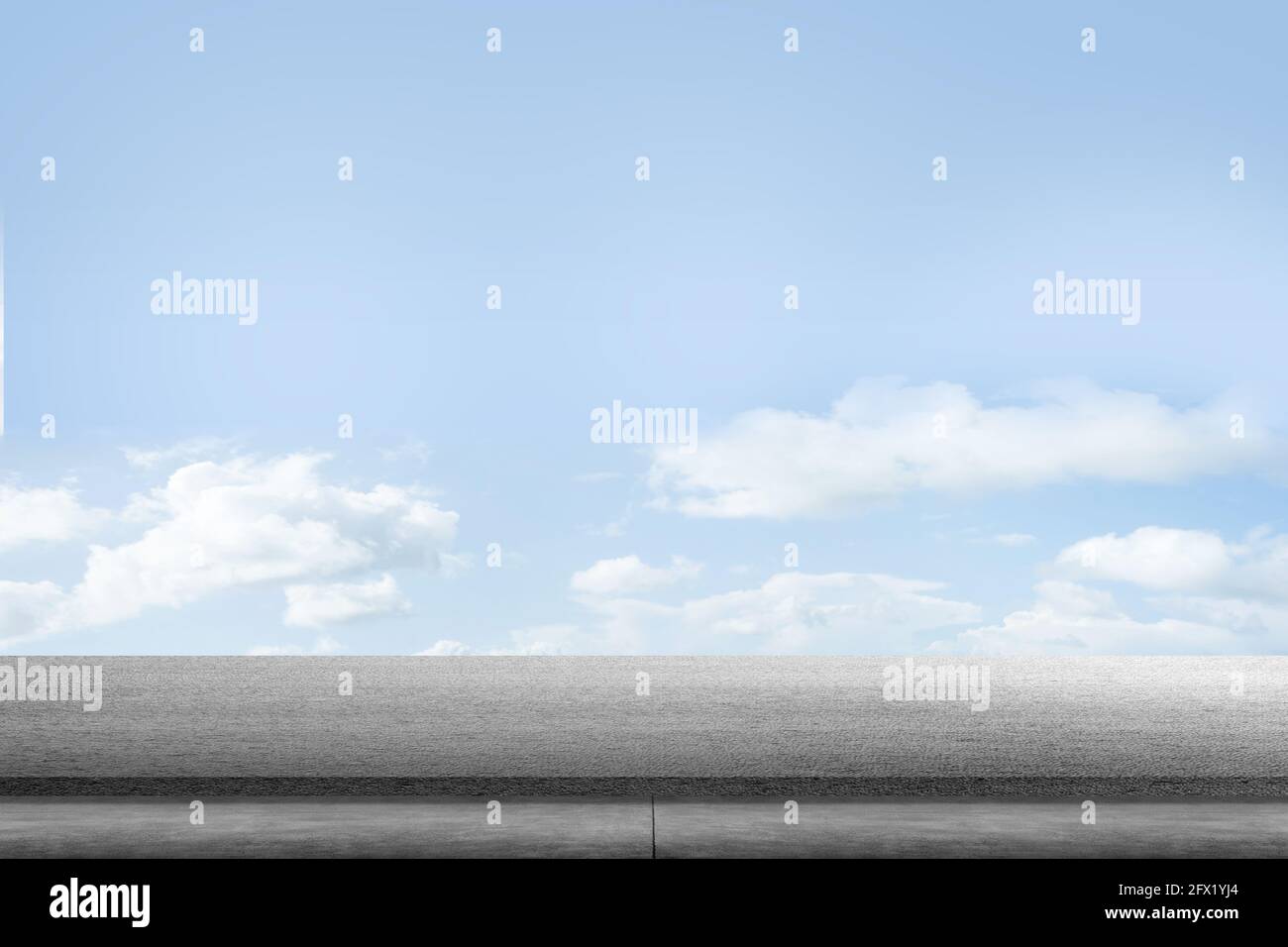 Asphalt road with blue sky background Stock Photo - Alamy
