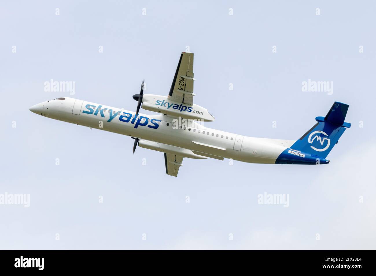 SkyAlps new Bombardier DHC-8-402Q departing on delivery flight. Stock Photo