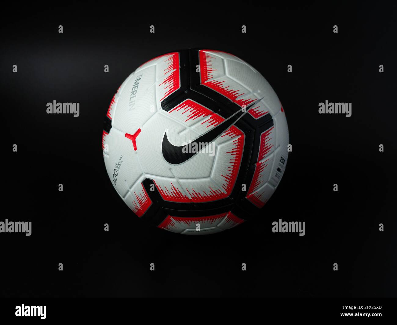 Miguel Ángel Encantada de conocerte Simpático Soccer ball on black background, nike football Stock Photo - Alamy