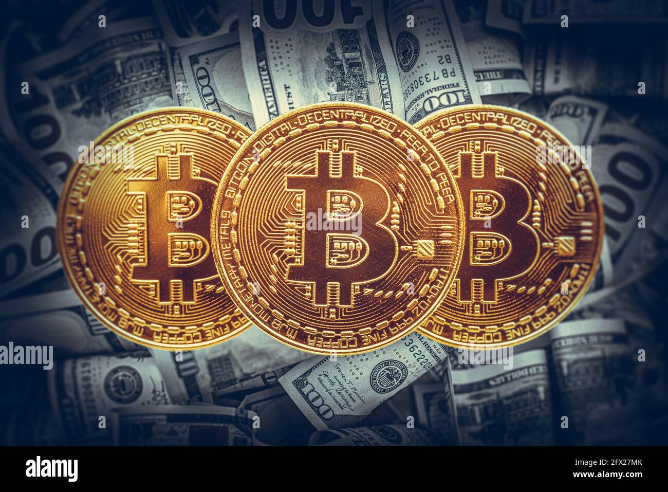 Bitcoin coin on the background of dollar bills Stock Photo - Alamy