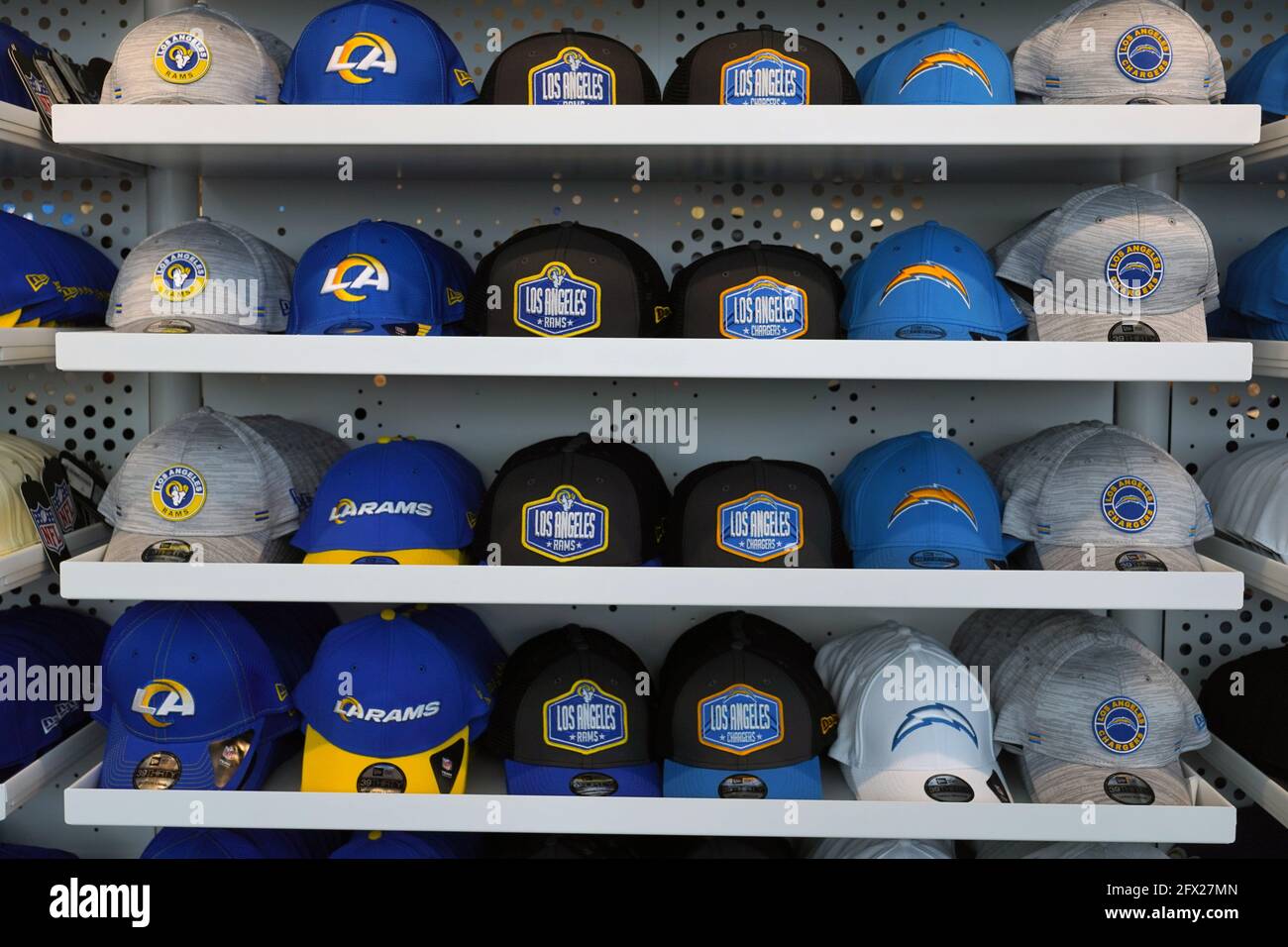 Inglewood, California, May 24, 2021, Los Angeles Rams and Los Angeles  Chargers hats on display at the Equipment Room team store atf SoFi Stadium,  Monday, May 24, 2021, in Inglewood, Calif. The
