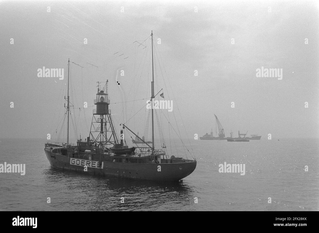 Goeree lighting platform is placed at Hoek van Holland instead of lightvessel Goeree, in foreground lightvessel Goeree on background light platform, July 22, 1971, light platforms, lightships, The Netherlands, 20th century press agency photo, news to remember, documentary, historic photography 1945-1990, visual stories, human history of the Twentieth Century, capturing moments in time Stock Photo