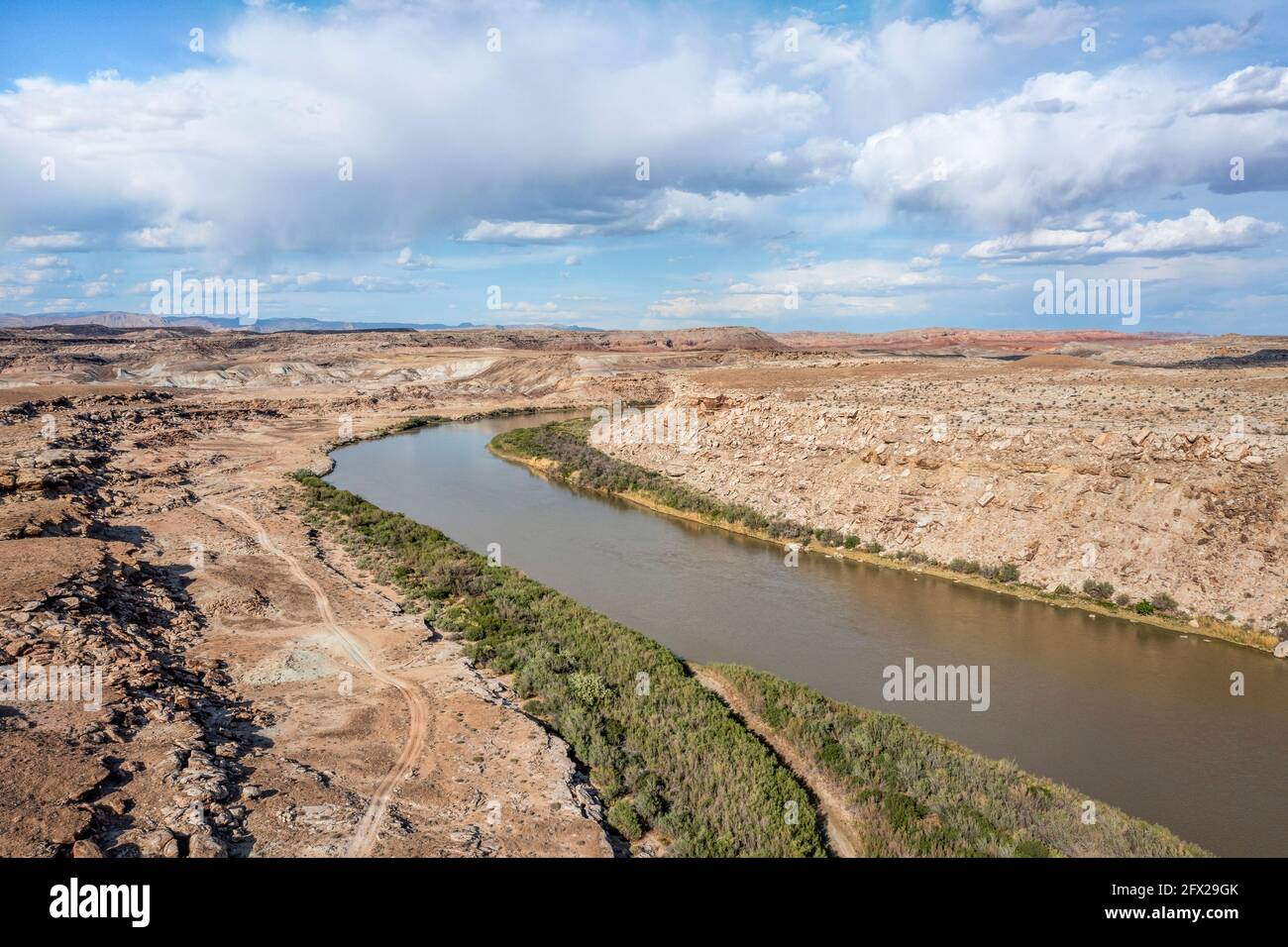 aerial view of Green River flowing below town of Green RIver in Utah