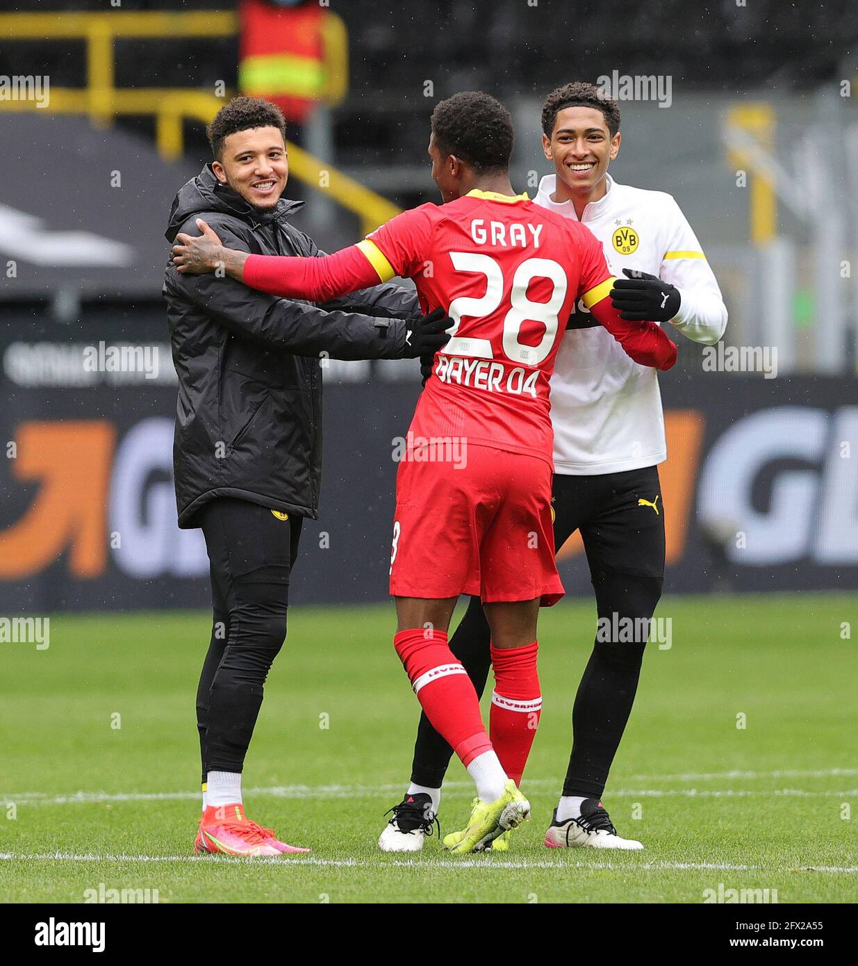 left to right Jadon SANCHO (DO), Demarai GRAY (LEV), Jude BELLINGHAM (DO) Soccer 1. Bundesliga, 34th matchday, Borussia Dortmund (DO) - Bayer 04 Leverkusen (LEV) 3: 1, on May 22, 2021 in Dortmund / Germany. Photo: Ralf Ibing / firo Sportphoto / Pool via Fotoagentur Sven Simon # DFL regulations prohibit any use of photographs as image sequences and / or quasi-video # Editorial Use ONLY # National and International News Agencies OUT ¬ Stock Photo