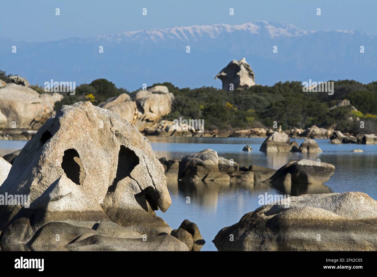 Caprera, rocce riflesse sul mare Stock Photo