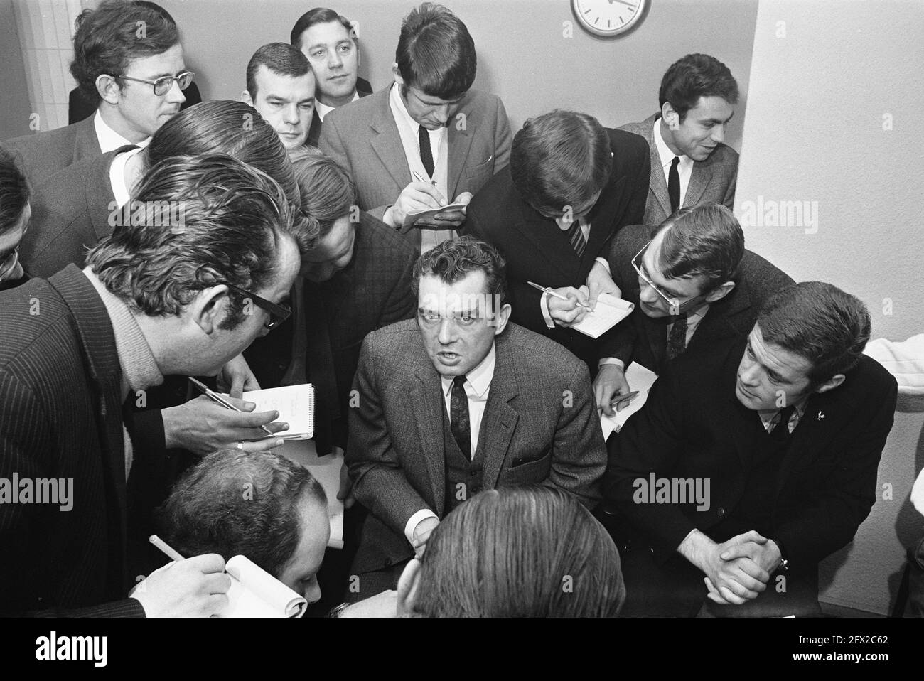 Draw in the quarter finals of the European Football Cup. Feyenoord drew against Vorwarts Berlin (East Germany). Trainer Ernst Happel speaks to the press, December 10, 1969, journalists, sports, trainers, soccer, The Netherlands, 20th century press agency photo, news to remember, documentary, historic photography 1945-1990, visual stories, human history of the Twentieth Century, capturing moments in time Stock Photo