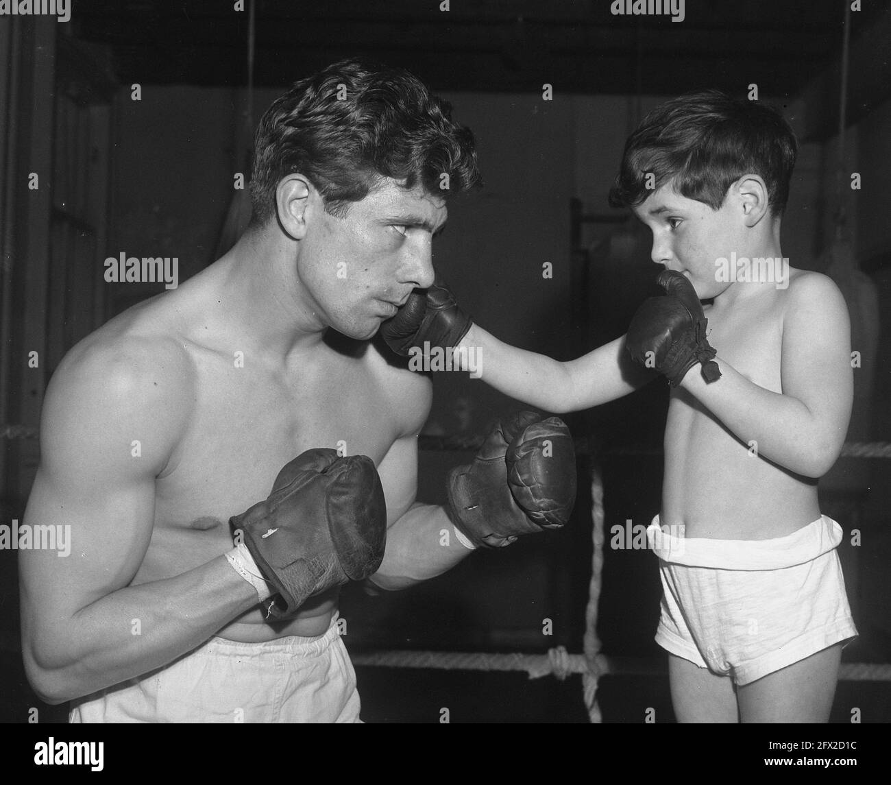 Luc van Dam with son 1949 Stock Photo Alamy