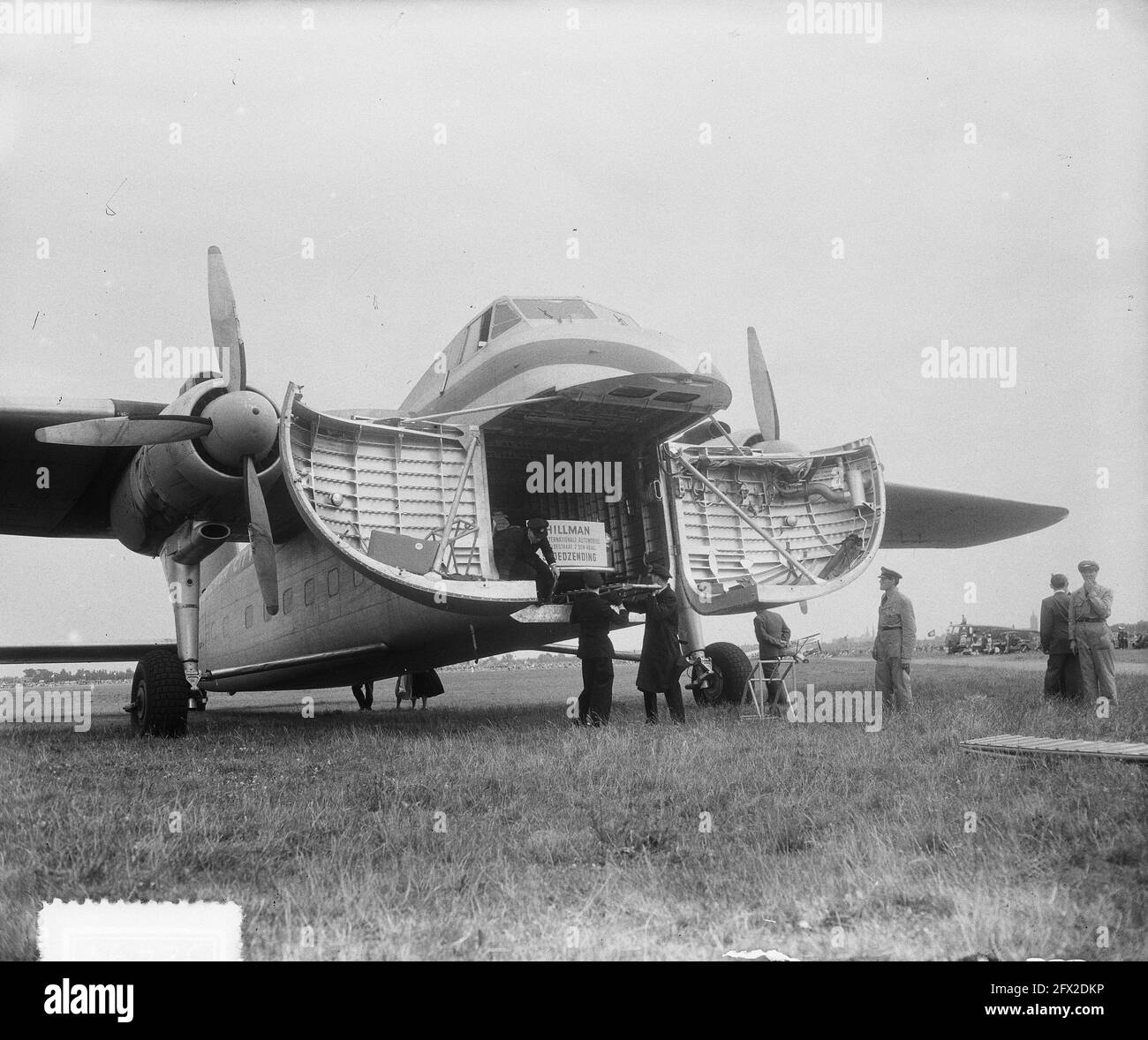 Air show Cargo plane with autos, August 2, 1952, autos, air shows, The  Netherlands, 20th century press agency photo, news to remember,  documentary, historic photography 1945-1990, visual stories, human history  of the