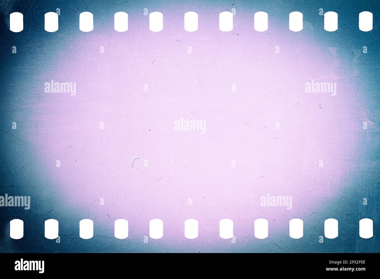Dusty and grungy 35mm film texture or surface. Perforated camera film ...