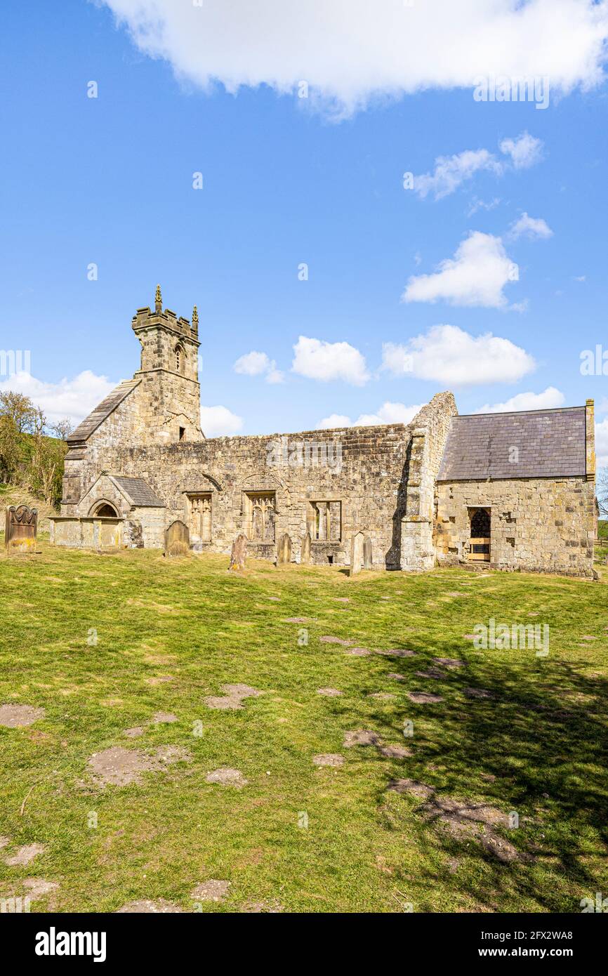 The ruins of St Martins church at Wharram Percy Deserted Medieval Village on the Yorkshire Wolds, North Yorkshire, England UK Stock Photo