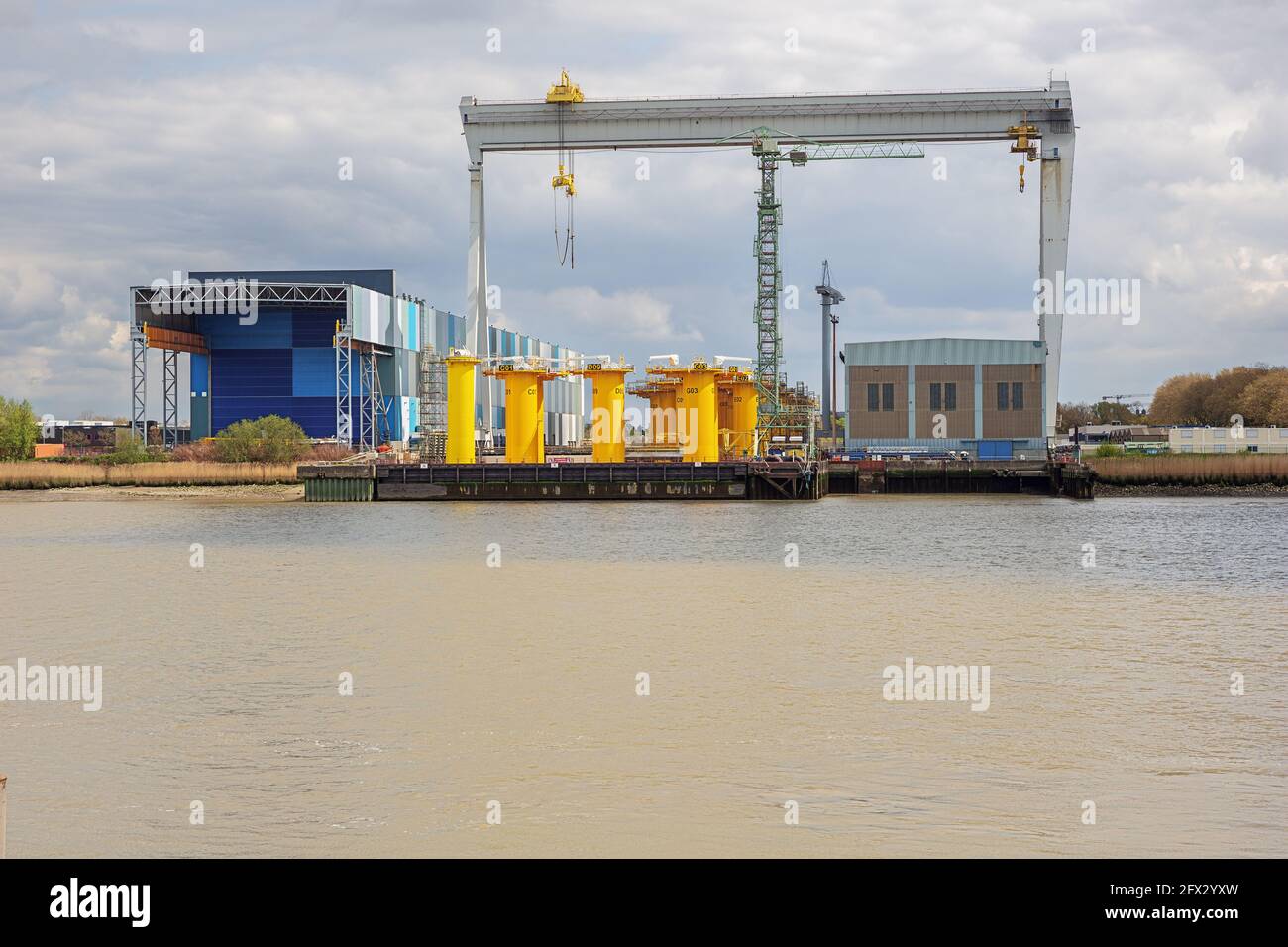 Editorial: HOBOKEN, ANTWERP, FLANDERS, BELGIUM, MAY 2nd, 2021 - View of windmill foundations the former shipyard in Hoboken seen from the left bank of Stock Photo