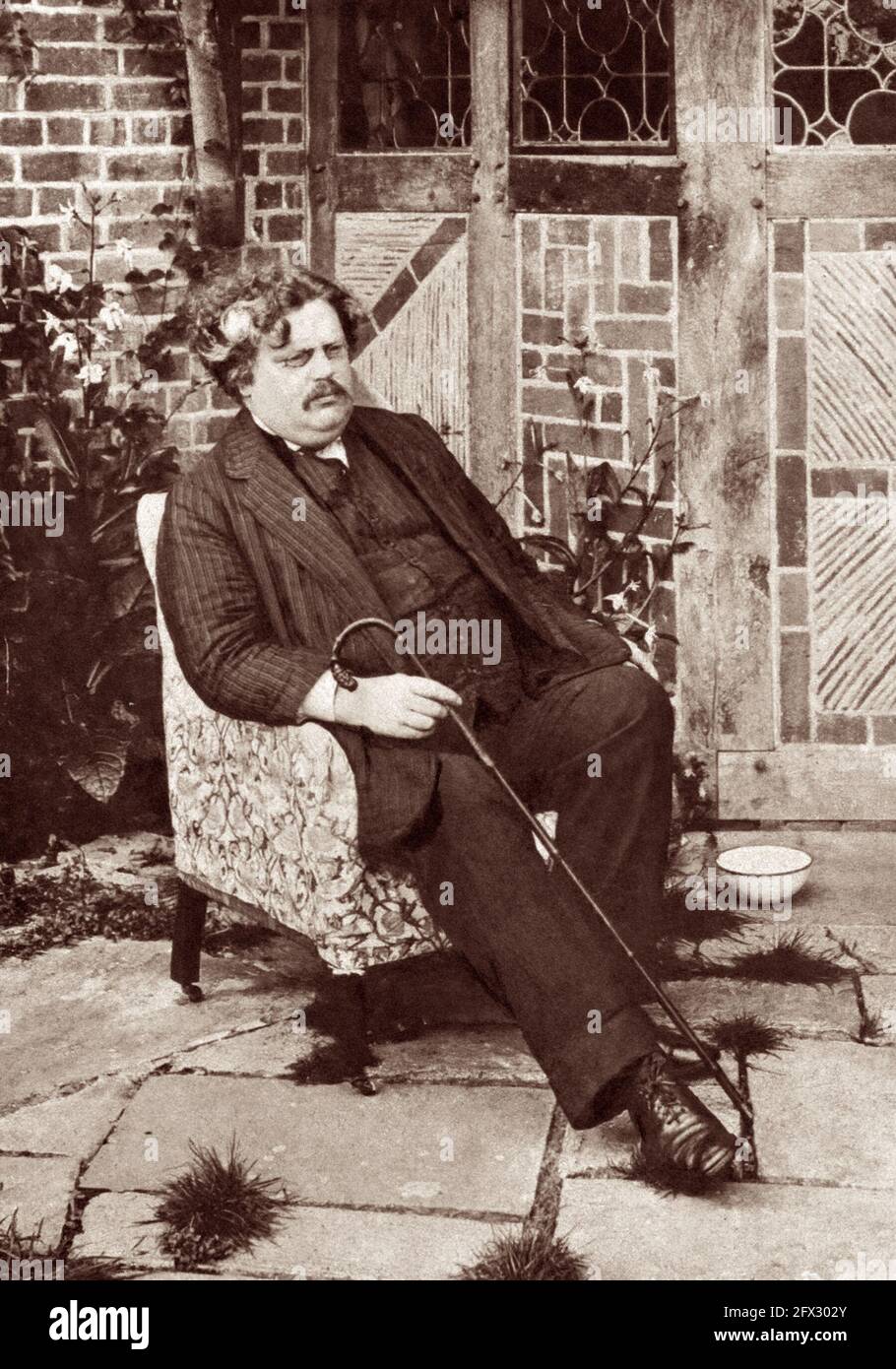 Gilbert Keith Chesterton (1874 - 1936), known as G.K. Chesterton, shown c1914, was a leading British author, thinker, journalist, arts critic, debater, lay theologian and Christian apologist of the early 20th Century. A prolific writer, he published nearly 100 books and over 4,000 newspaper columns and essays. Stock Photo