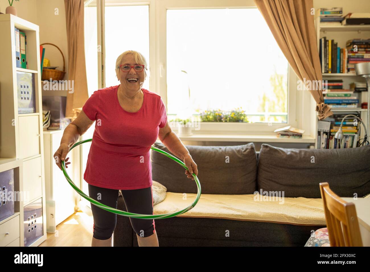 Hula hoop mature woman hi-res stock photography and images - Alamy