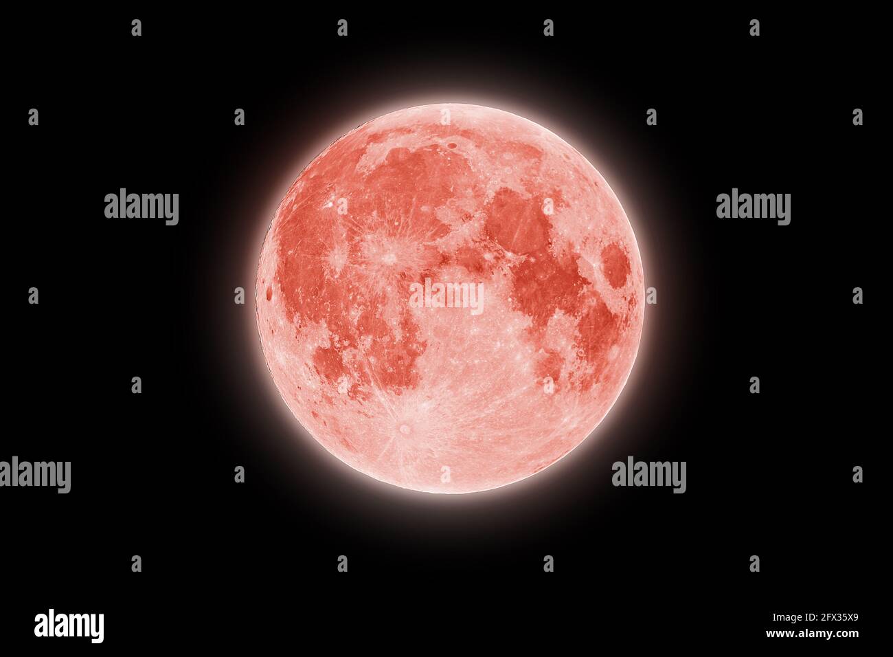 Full red strawberry supermoon halo glowing on black night ...