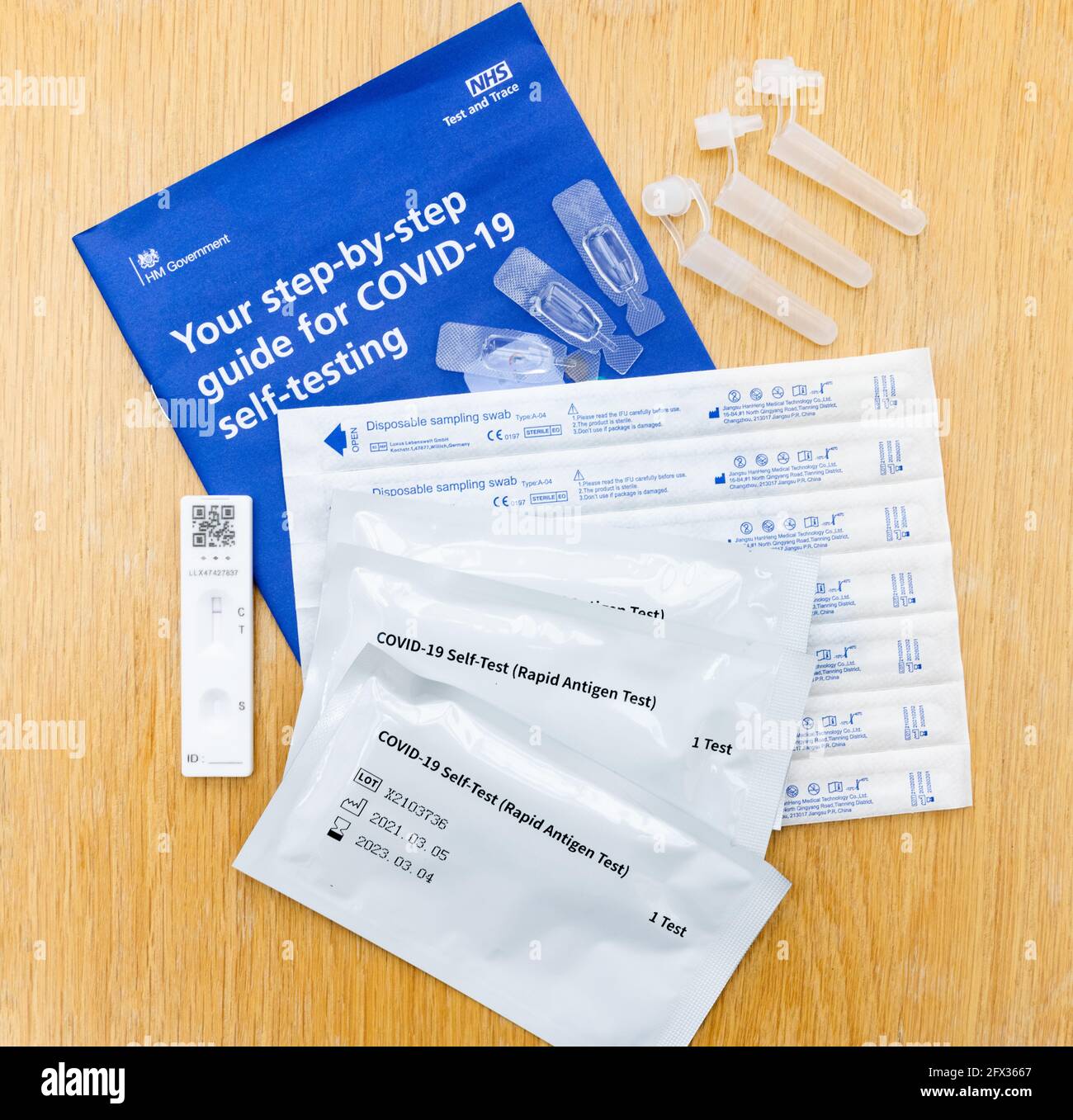 Selection of contents from an NHS Test and Trace Covid 19 Self Test Rapid Antigen Test kit used for home testing for the Coronavirus disease Stock Photo