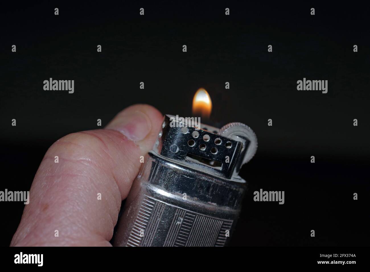 Old cigarette lighter isolated closeup Stock Photo Alamy