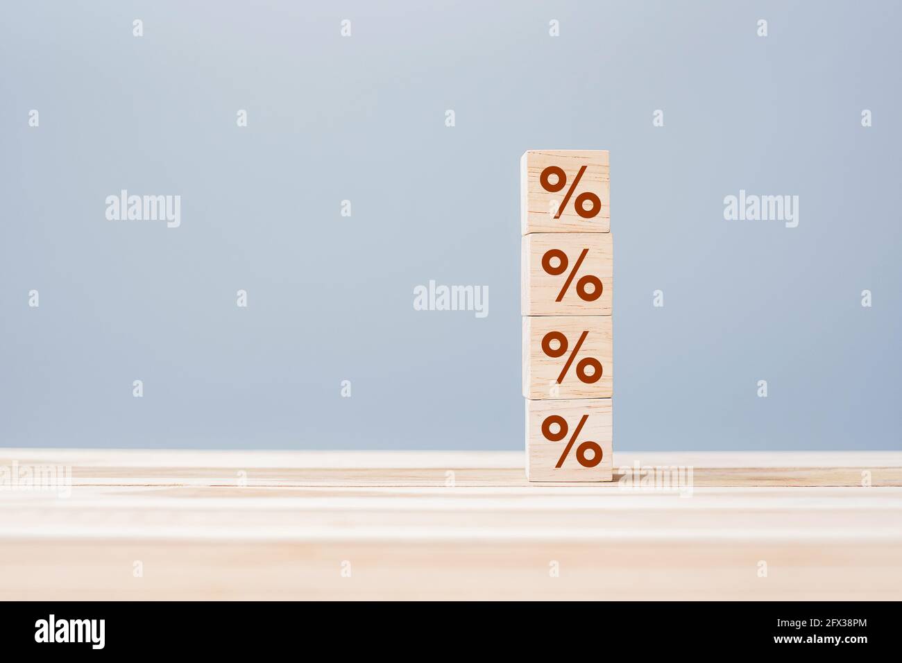 wood cube block with percentage symbol icon. Interest rate,  financial, ranking and mortgage rates concept Stock Photo