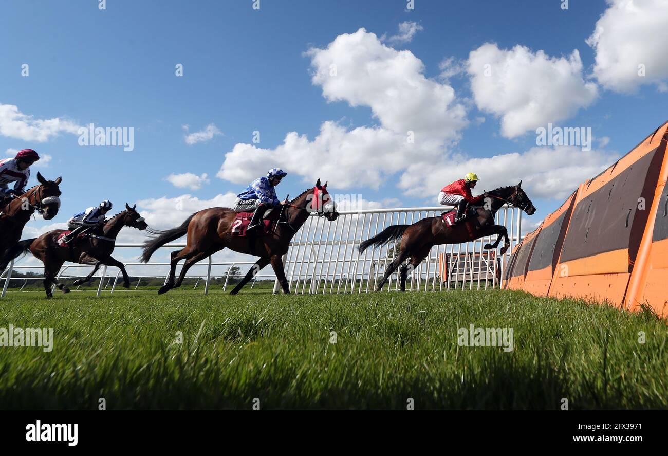 Butler's Brief and jockey Nick Scholfield clear a fence during the Bangor-On-Dee Leading Jockey 2020-2021 Season Handicap Hurdle at Bangor-on-Dee Racecourse. Picture date: Tuesday May 25, 2021. Stock Photo