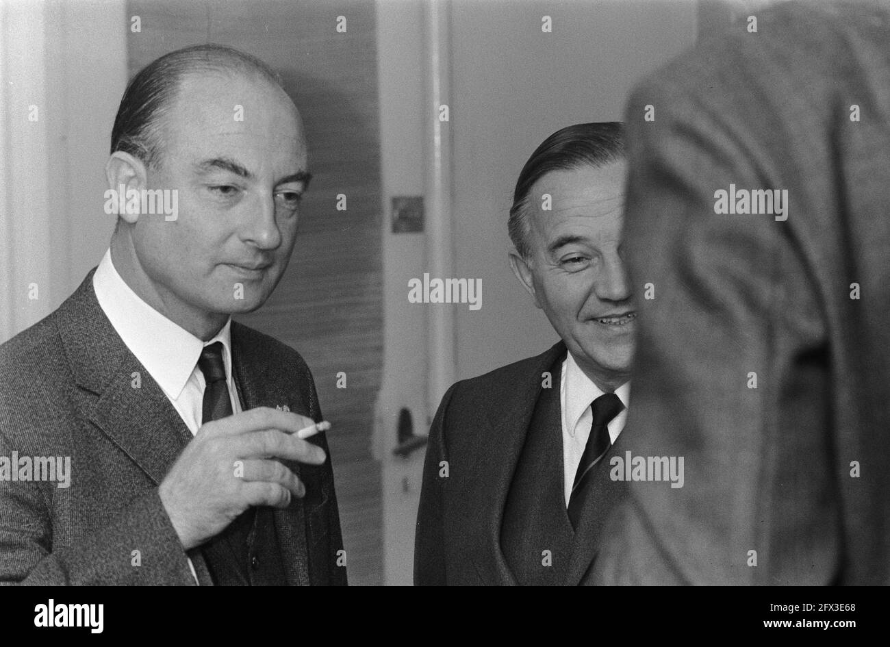 Prime Minister De Jong receives from Henk Kersting (Chairman of the Foreign Press) the book  Resurrecting with Falling and Rising by H. M. Bleich, published by De, November 19, 1969, The Netherlands, 20th century press agency photo, news to remember, documentary, historic photography 1945-1990, visual stories, human history of the Twentieth Century, capturing moments in time Stock Photo